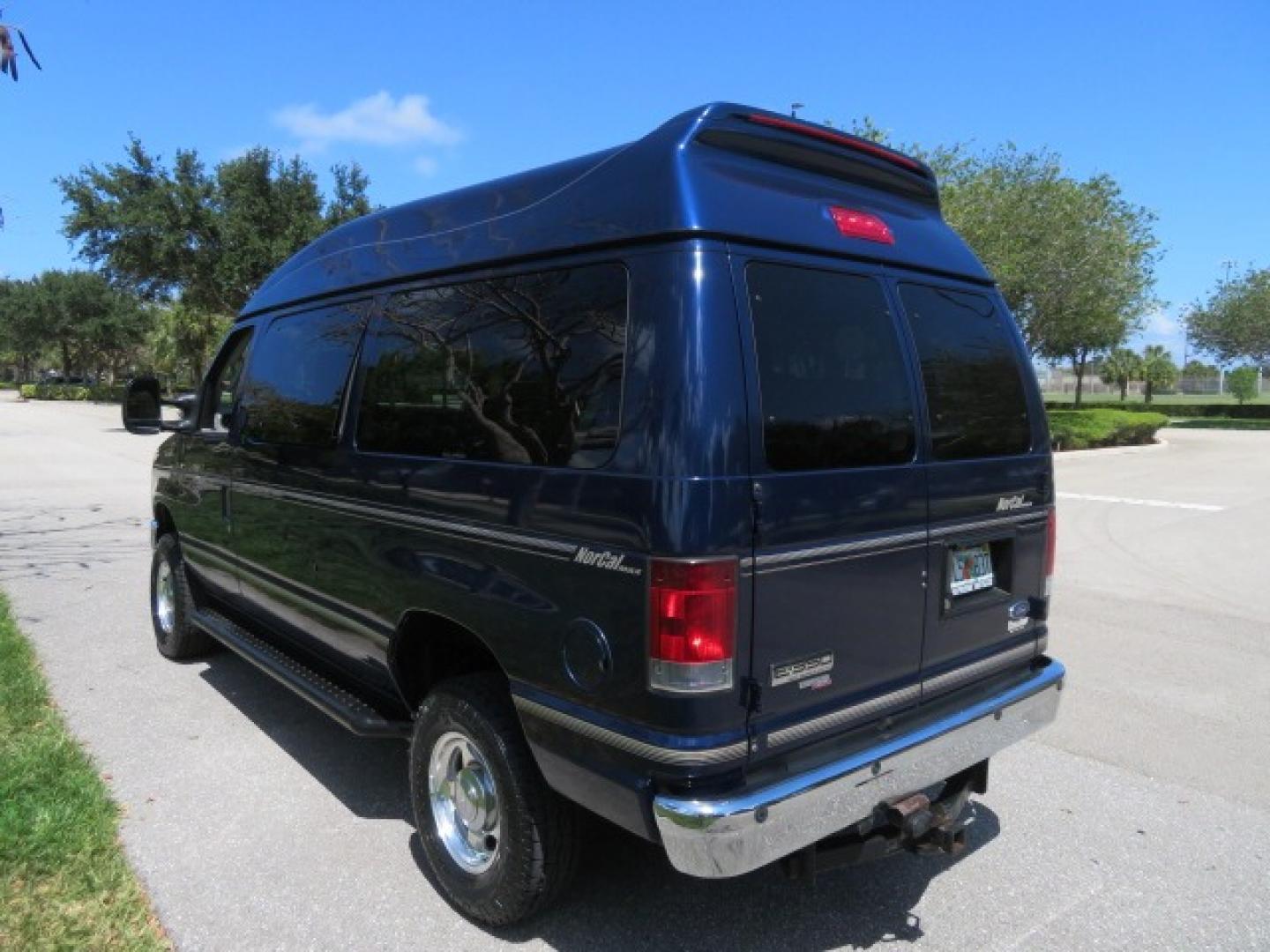 2011 Dark Blue /Gray Ford E-Series Wagon E-350 XLT Super Duty (1FBNE3BS4BD) with an 6.8L V10 SOHC 20V engine, located at 4301 Oak Circle #19, Boca Raton, FL, 33431, (954) 561-2499, 26.388861, -80.084038 - You are looking at a Gorgeous 2011 Ford Econoline E350 XLT Norcal Max High Top Handicap Wheelchair Conversion Van with 6.8L V10, 15K Original Miles, 9 Inch Lowered Floor, Braun UVL Side Entry Wheelchair Lift, Remote Control Power Side Entry Doors, Expanded Side Entry Doors, Q Straint Tie Down, Syste - Photo#23